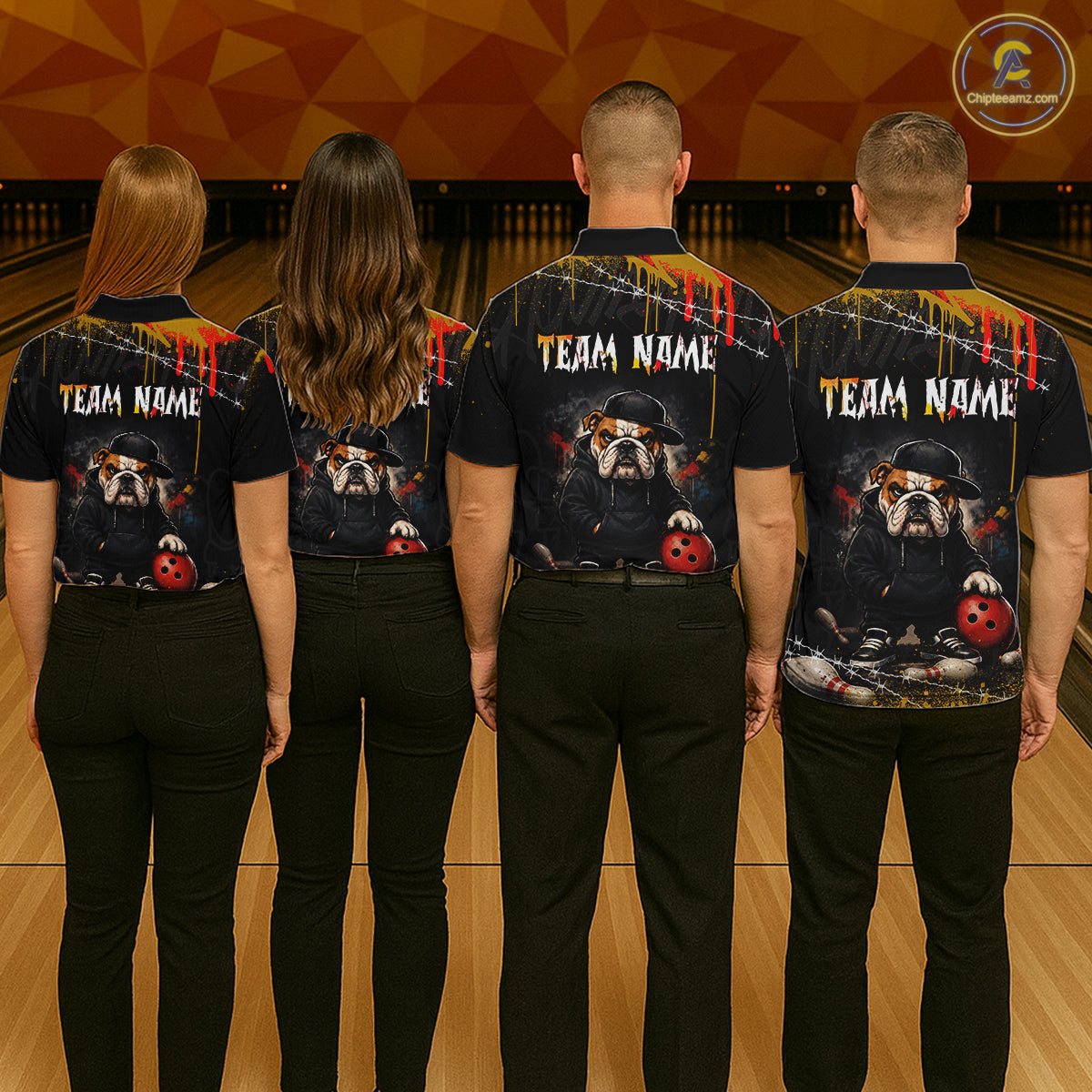 Four people standing with their backs to the camera in a bowling alley, wearing matching black short-sleeve shirts with a custom bulldog graphic and 'TEAM NAME' printed across the back.