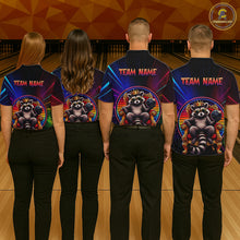 Load image into Gallery viewer, Four people wearing matching shirts with raccoon graphics and 'TEAM NAME' text in a bowling alley.