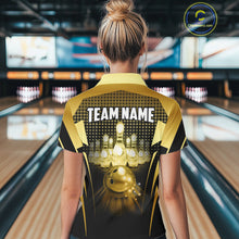 Load image into Gallery viewer, Female model wearing a custom black gold bowling quarter-zip shirt back view displaying the personalized team name above a glowing bowling ball and illuminated bowling pins graphic at the bowling alley
