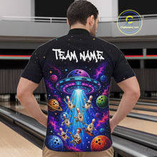 Load image into Gallery viewer, Person wearing a black shirt with a colorful alien abduction design and 'Team Name' text.