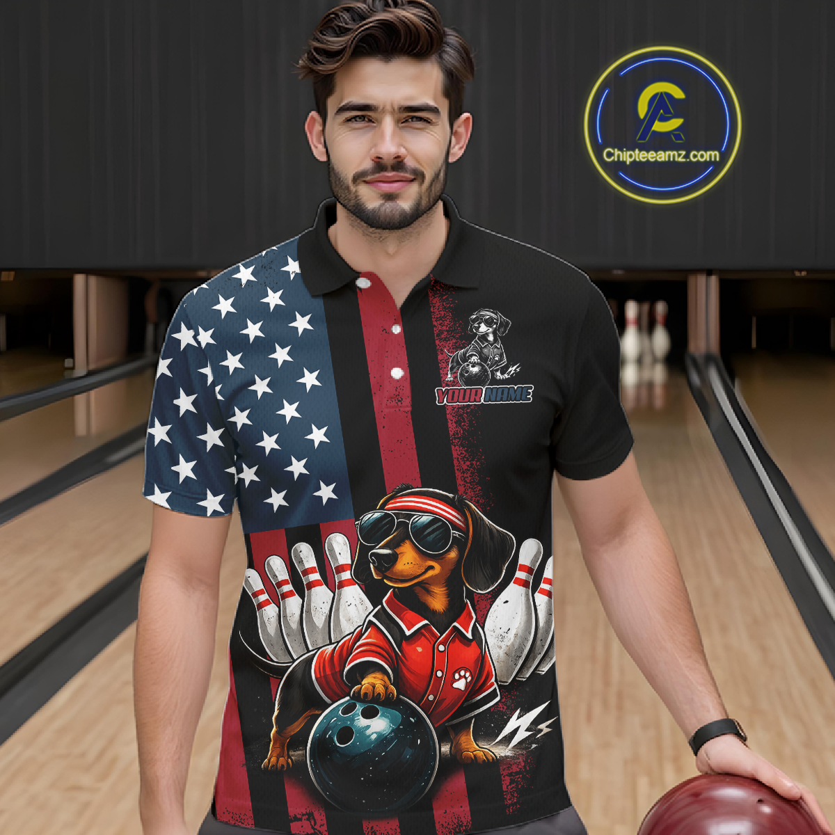 Man wearing a colorful polo shirt with a dachshund graphic in a bowling alley.
