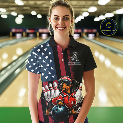 Woman wearing a colorful bowling-themed shirt in a bowling alley.