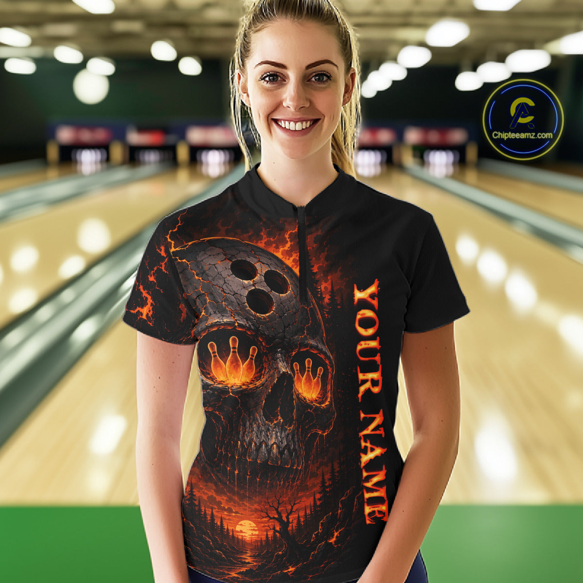 Woman wearing a black shirt with a skull design and 'Your Name' text in a bowling alley.