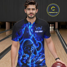 Load image into Gallery viewer, Man wearing a black polo shirt with blue wolf design in a bowling alley.