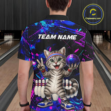 Load image into Gallery viewer, Person wearing a colorful bowling-themed shirt with a cat design in a bowling alley.