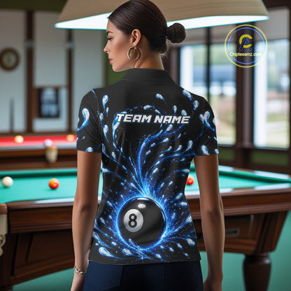 Person wearing a black shirt with a blue and white design and 'TEAM NAME' text, standing in a pool hall.