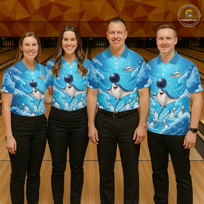 Four people standing together in a bowling alley wearing matching bright blue short-sleeve bowling shirts with a large cartoon shark graphic and black pants.