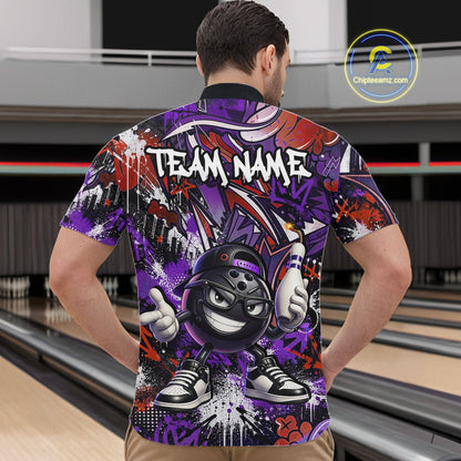Man wearing a colorful bowling shirt with a cartoon bowling ball design in a bowling alley.