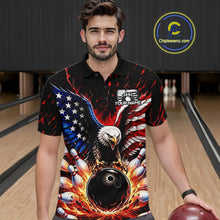 Load image into Gallery viewer, Man wearing a black polo shirt with an eagle and bowling design in a bowling alley.