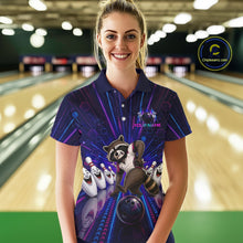 Load image into Gallery viewer, Woman wearing a colorful bowling shirt with a raccoon design in a bowling alley.