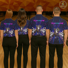 Load image into Gallery viewer, Four people wearing matching shirts with a logo and text on a bowling alley background