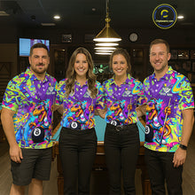 Load image into Gallery viewer, Four people wearing colorful shirts with a dinosaur and pool ball design in a bar setting.