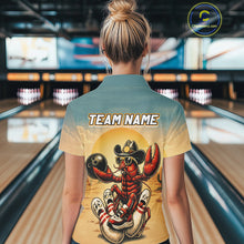 Load image into Gallery viewer, Person wearing a shirt with a crawfish bowling design in a bowling alley.