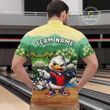 Load image into Gallery viewer, Person wearing a bowling-themed shirt with a cartoon character in a bowling alley.