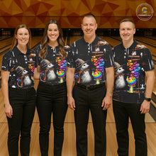 Load image into Gallery viewer, Four people standing together in a bowling alley wearing matching black short-sleeve bowling shirts with a colorful opossum and rainbow bowling graphic, paired with black pants.