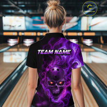 Load image into Gallery viewer, Woman wearing a black bowling polo shirt featuring a flaming skull with glowing orange eyes, purple smoke effects, and custom “TEAM NAME” 