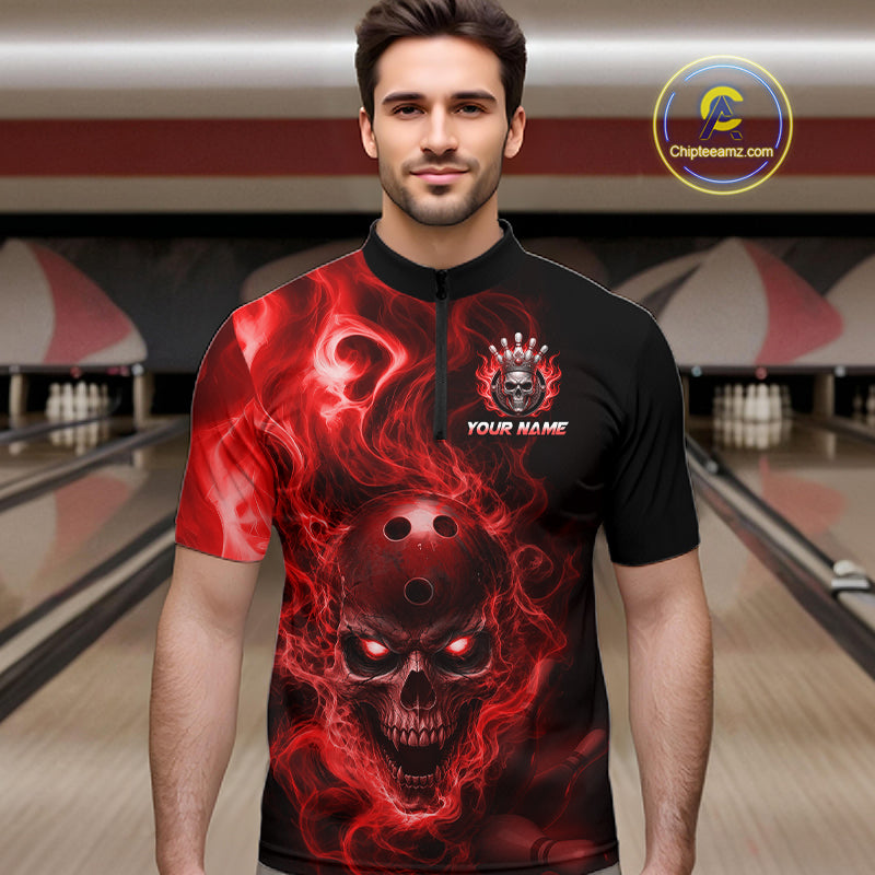 Man wearing a black bowling quarter zip shirt featuring a flaming skull with glowing red eyes, red smoke effects, and custom “YOUR NAME” text.