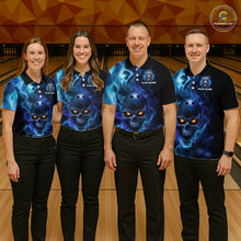 Load image into Gallery viewer, Four people wearing matching blue and black shirts with a skull design on a bowling alley.