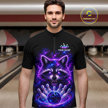 Load image into Gallery viewer, A man wearing a black short-sleeve zip-front bowling jersey with a large glowing raccoon graphic in purple, blue, and pink on the front, standing in a bowling alley. The shirt has a small crown logo and the text 'YOUR NAME' on the chest.