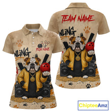 Load image into Gallery viewer, Front and back views of a beige short-sleeve polo shirt featuring a cartoon bulldog wearing a yellow jacket and holding red bowling balls, with 'TEAM NAME' and 'BOWLING' text and paw-print graphics on a white background. A 'ChipteeAmz' logo appears in the bottom right corner.
