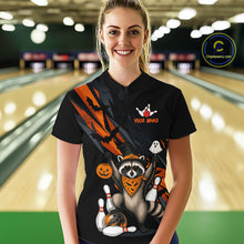 Load image into Gallery viewer, Women wearing a black Halloween bowling quarter zip featuring a raccoon wearing an orange bandana, ghost and pumpkin accents, bowling pins and ball, with personalized name and team name text.