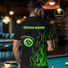 Load image into Gallery viewer, Men wearing billiards polo shirt featuring an eight ball design surrounded by flowing green flame graphics on a black background.