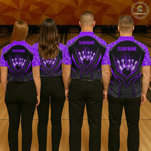 Load image into Gallery viewer, Four people wearing matching purple and black bowling shirts with a team name on a bowling alley.