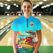 Load image into Gallery viewer, Person wearing a colorful bowling shirt with a beach-themed design in a bowling alley.