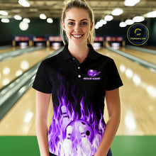 Load image into Gallery viewer, Woman wearing a black bowling shirt with a purple flame design in a bowling alley.
