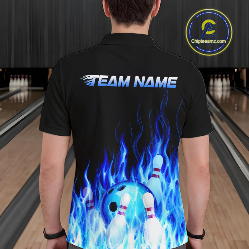 Person wearing a black bowling shirt with blue flames and 'TEAM NAME' text in a bowling alley.