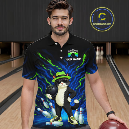 A man wearing a black short-sleeve polo shirt with a colorful bowling-themed cat graphic, standing in a bowling alley. The shirt features a cartoon cat in a green hat and sunglasses holding a bowling ball, with bowling pins and blue lightning effects.