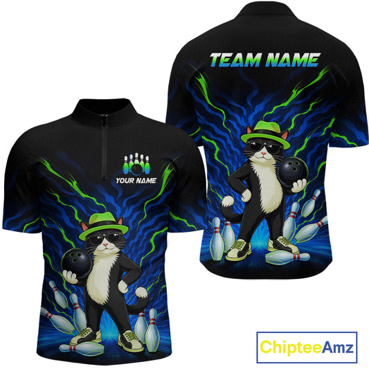 Black short-sleeve quarter-zip shirt shown from front and back, featuring a cartoon cat bowling graphic with green hat, black sunglasses, bowling balls, pins, and blue/green lightning effects. Front has placeholder text 'YOUR NAME' and chest bowling pins; back has 'TEAM NAME'.