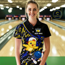 Load image into Gallery viewer, Person wearing a colorful bowling shirt with a cartoon character in a bowling alley.
