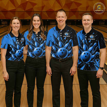 Four people standing together in a bowling alley wearing matching blue and black short-sleeve bowling shirts with a large blue bowling ball graphic on the front, paired with black pants. A bowling lane and orange geometric wall are visible in the background.