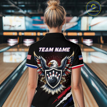 Load image into Gallery viewer, Person wearing a black bowling shirt with eagle design and 'Team Name' text in a bowling alley.