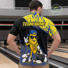 Load image into Gallery viewer, Man wearing a bowling-themed shirt with a cartoon character and 'Team Name' text in a bowling alley.