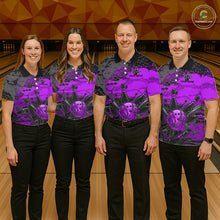 Load image into Gallery viewer, Four people wearing matching purple and black shirts with a skull design on a bowling alley.