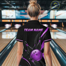 Load image into Gallery viewer, Person wearing a black bowling shirt with a purple bowling ball design and 'TEAM NAME' text in a bowling alley.