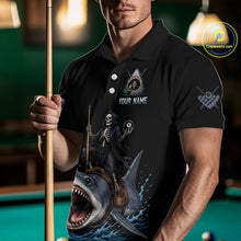 Load image into Gallery viewer, Man wearing a black polo shirt with a shark and skeleton design, holding a pool cue in a billiards setting.