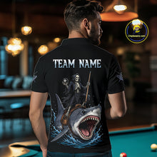 Load image into Gallery viewer, Man wearing a black t-shirt with a graphic design of a skeleton on a shark, with 'TEAM NAME' text, in an indoor setting.