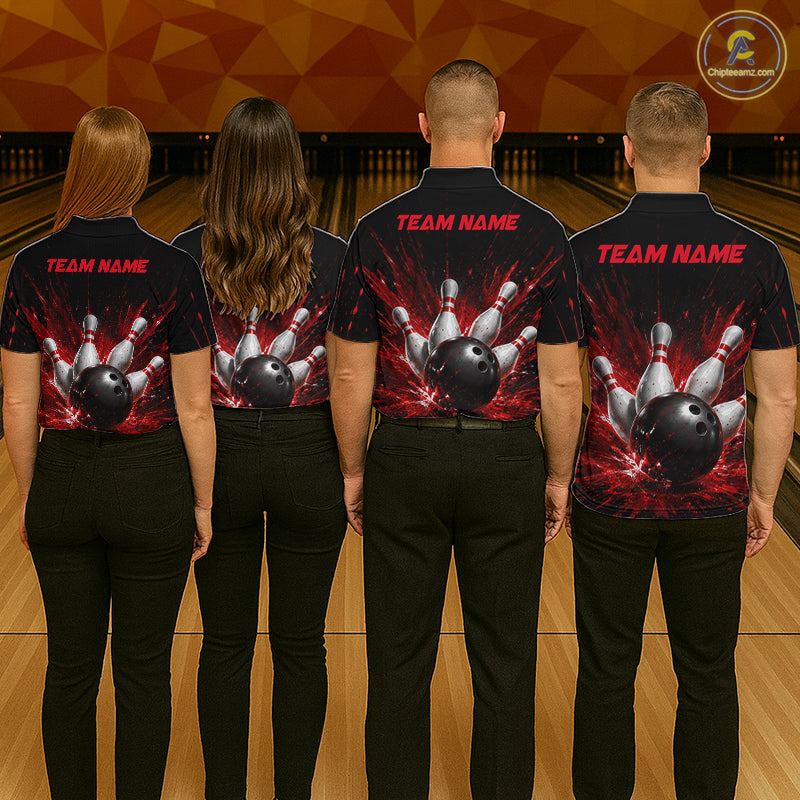 Four people wearing a black bowling quarter zip shirt with dramatic red splatter graphics, a large black bowling ball, and flying pins, plus custom team name text.