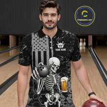 Load image into Gallery viewer, A man wearing a black and gray graphic polo shirt with a skeleton holding a bowling ball and a beer glass, standing in a bowling alley. The shirt features a distressed American flag design and the text 'YOUR NAME'.