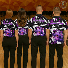 Load image into Gallery viewer, Four people wearing wearing of a black, white, and purple bowling quarter zip shirt featuring a cheerful purple hippo holding a bowling ball, with custom team name text.