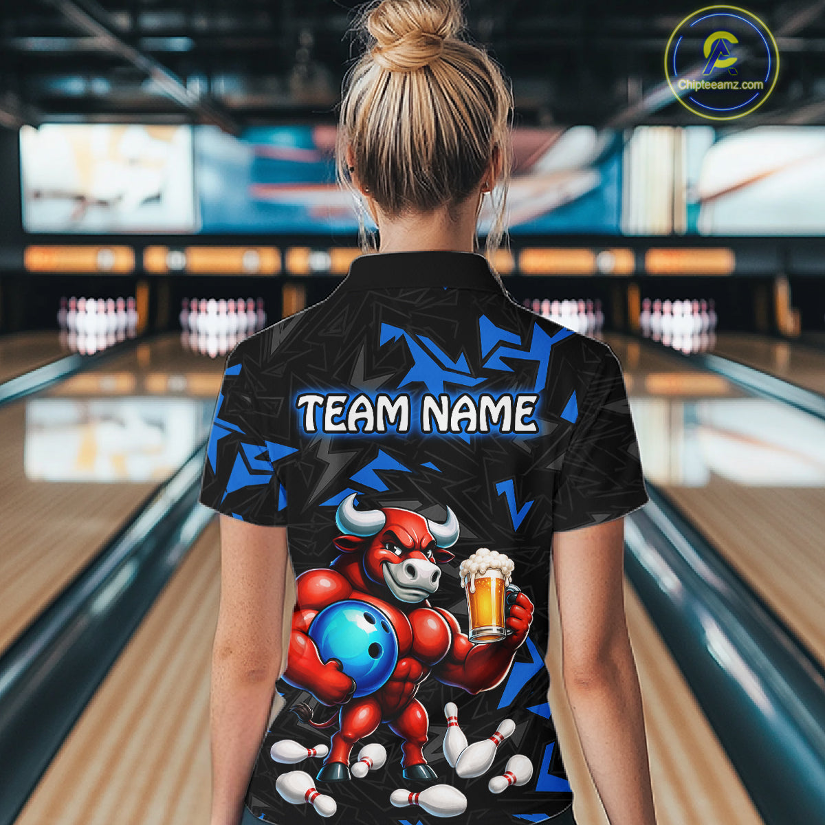 Women’s blue beer bull bowling polo shirt, back view on female model in bowling lane 