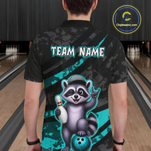 Load image into Gallery viewer, Person wearing a bowling-themed shirt with a raccoon graphic in a bowling alley.