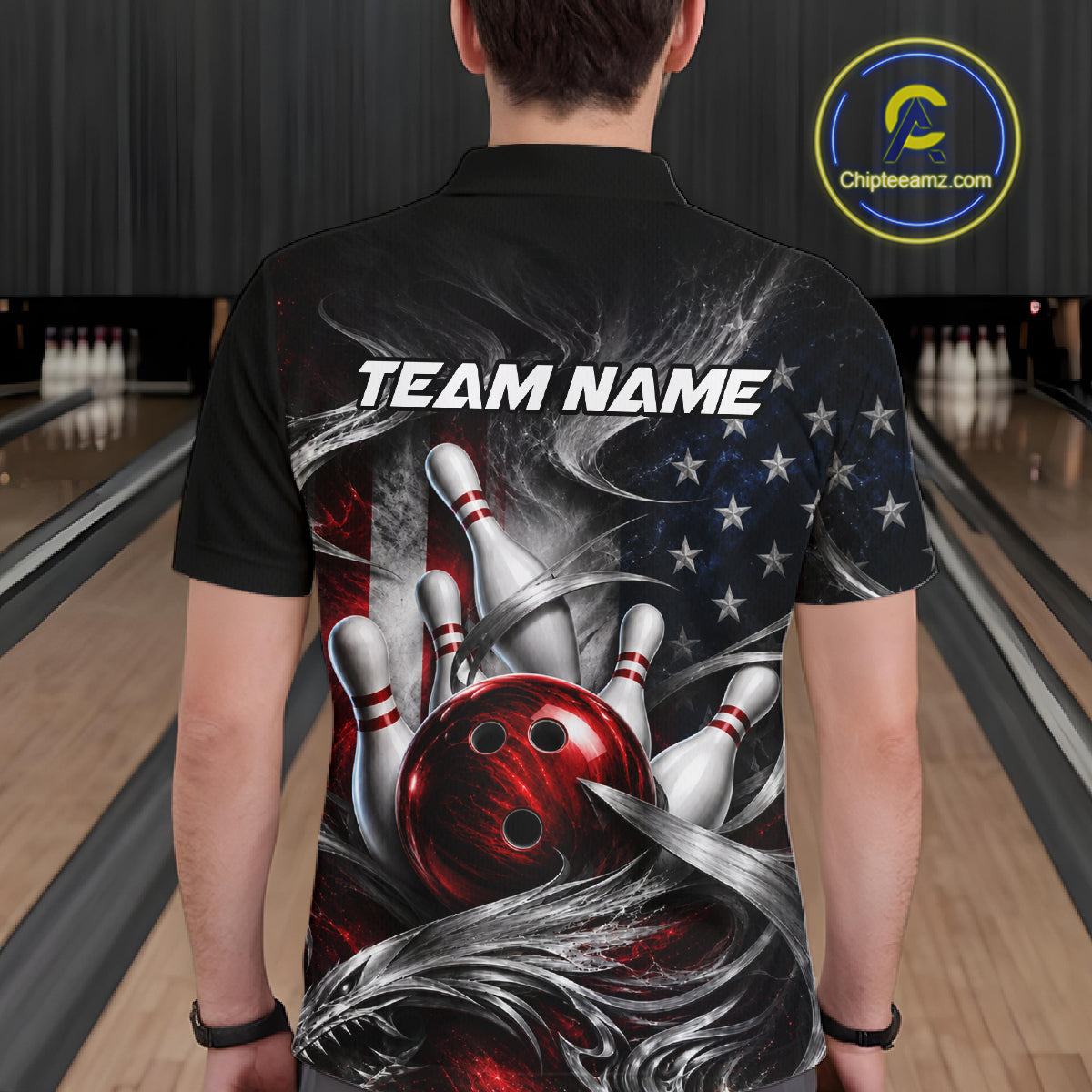 A person viewed from behind wearing a black short-sleeve polo shirt with a large bowling-themed graphic print. The design features a red bowling ball, white bowling pins, an American flag motif, and the text 'TEAM NAME' across the upper back.