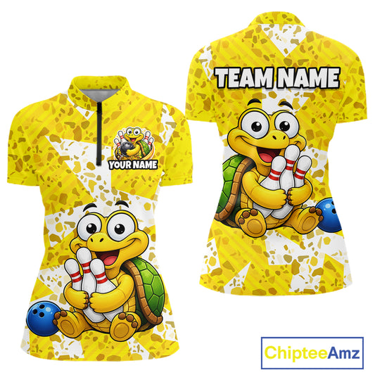 Front and back views of a bright yellow bowling quarter zip shirt with abstract splatter patterns, featuring a cheerful cartoon turtle holding bowling pins and a blue bowling ball graphic.