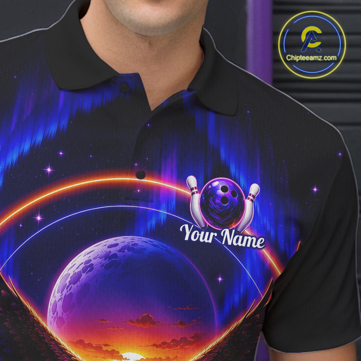 Man wearing a black bowling quarter zip with a eagle, glowing planet backdrop, bowling pins, and custom player name text.