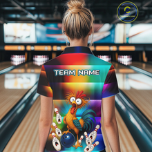 Load image into Gallery viewer, Woman wearing a colorful bowling polo featuring a shocked rooster chicken, blue bowling ball, surprised pins, and custom team name text.