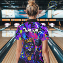 Load image into Gallery viewer, Women wearing personalized bowling quarter zip shirt with a crowned cat holding a bowling ball, blended with colorful paint strokes and graphic patterns.